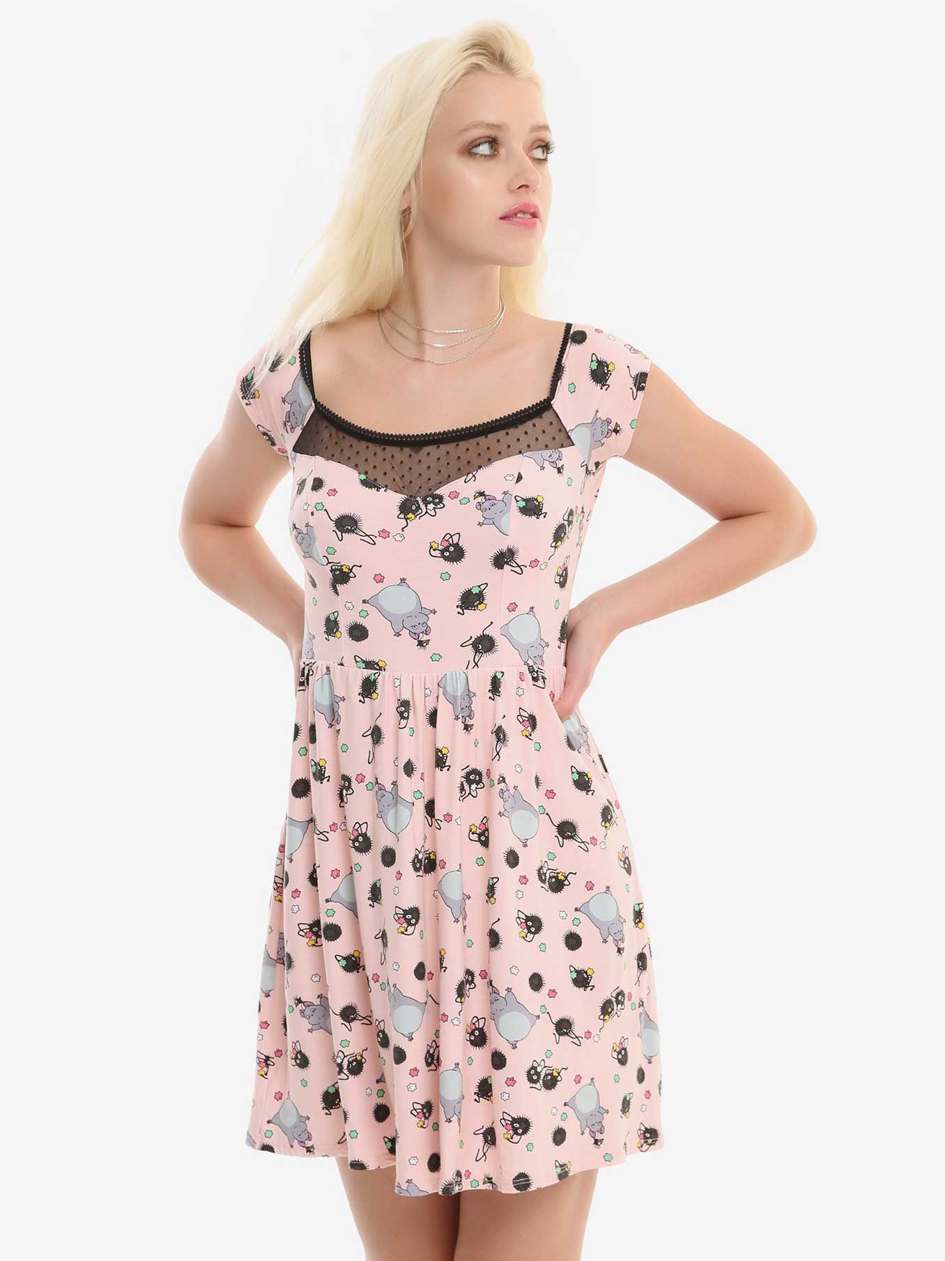 pink dress with cartoon animals and black lace accent