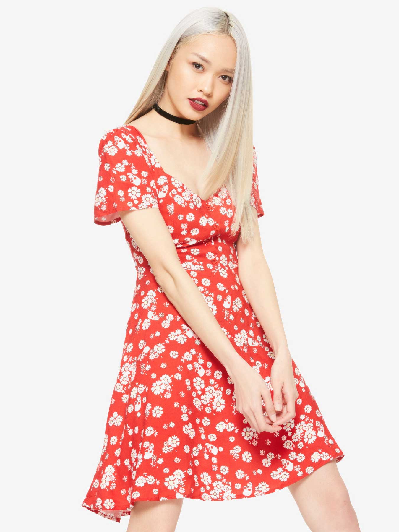 red-orange summer dress with white skulls and flowers