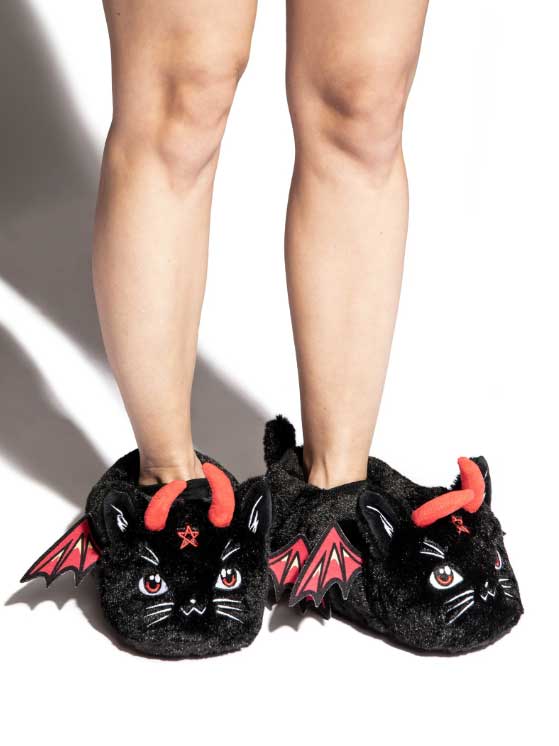 wearing devil cat slippers